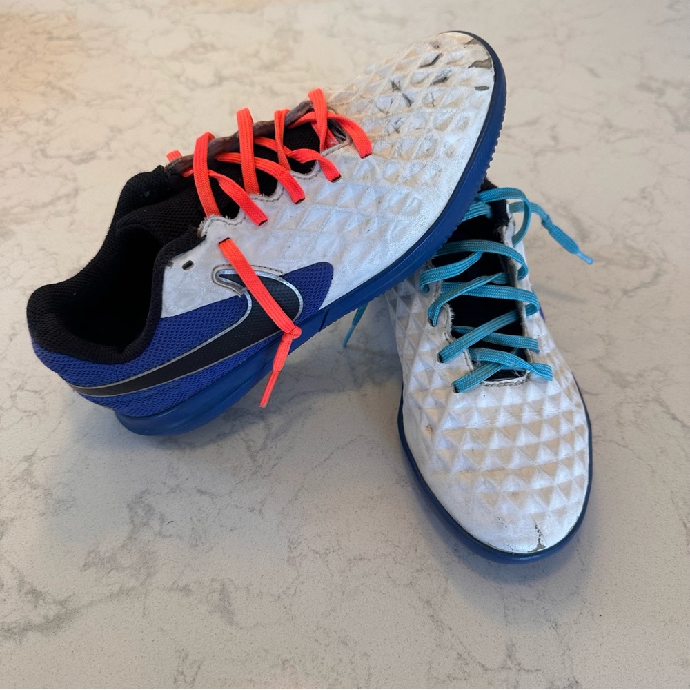 Nike Kids React Tiempo Legend indoor flats with Neon Coral and Teal Laces